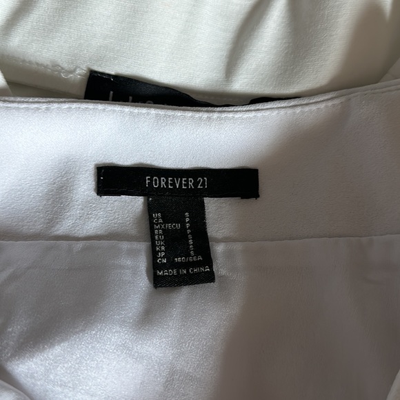 White Skirt Bundle. both size smalls. Brands are forever 21 and lioness - Picture 3 of 3
